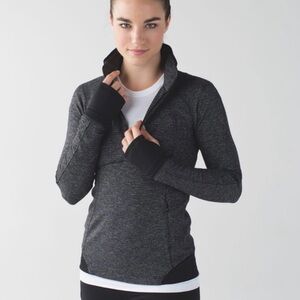 Lululemon cold weather, run,  1/2 zip pull over.  Size 6.‎  Black, dark gray.